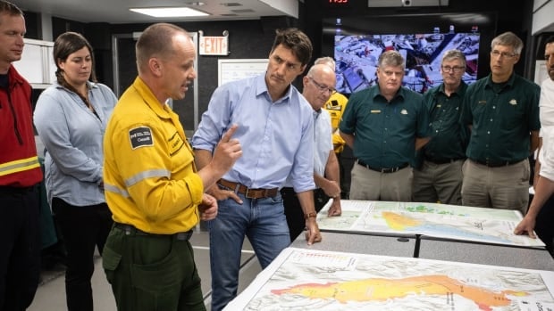 Jasper wildfire evacuees tour town as Trudeau visits command centre