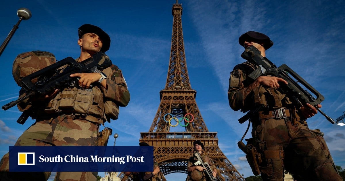 Man arrested for climbing Eiffel Tower, area evacuated before Olympics closing ceremony