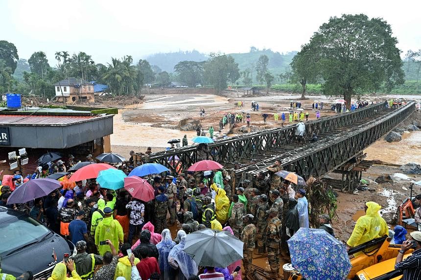 Rescue operations for Indian landslides speed up with new metal bridge