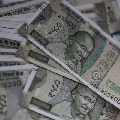 Rupee nears 84 per US dollar tracking Asian peers, foreign outflows