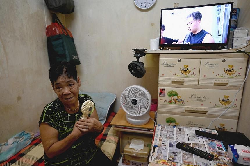 Scorching heat magnifies housing crunch for Hong Kong's elderly