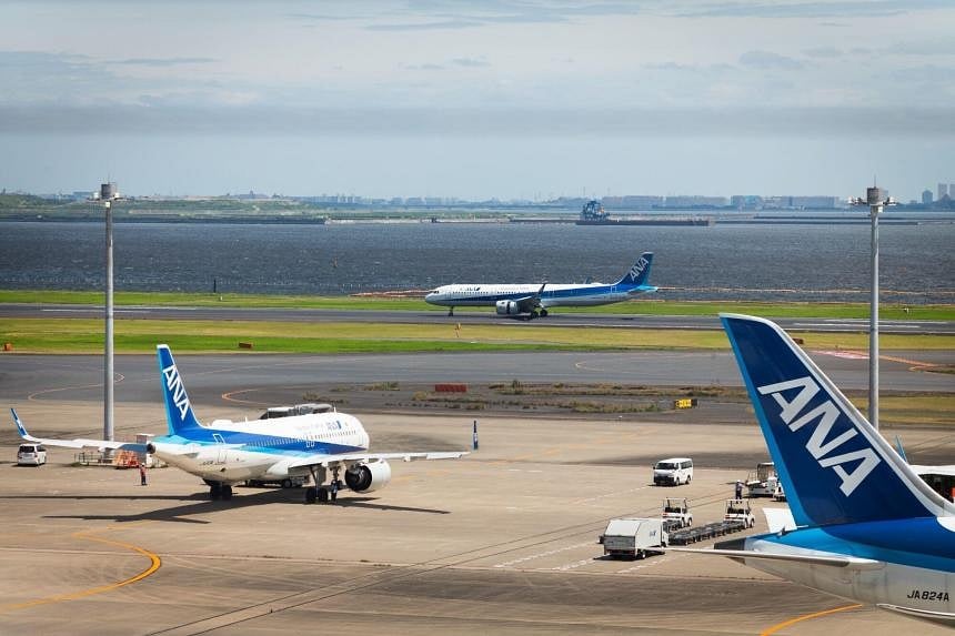 Severe Typhoon Ampil approaching Japan disrupts flights, trains