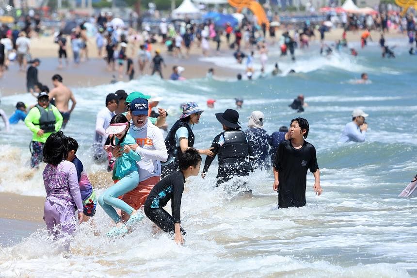 South Korea sizzles as temperatures soar to 40 deg C for the first time since 2019