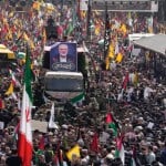 Supreme leader prays over the coffin of Haniyeh, whose killing risks a wider war