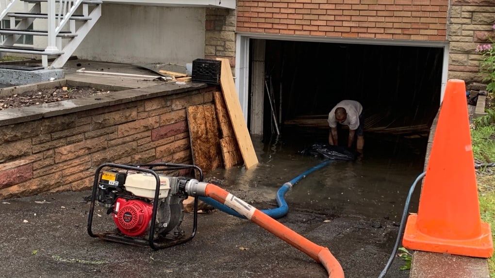 Tens of thousands without power, roads washed out as heavy rain hammers Montreal