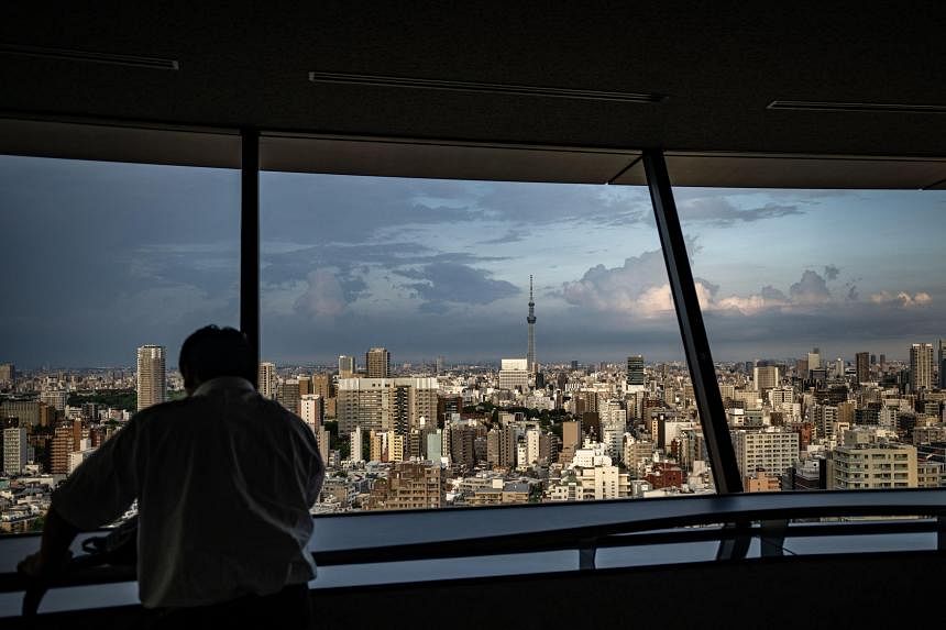 Typhoon Ampil approaches Tokyo, holiday traffic snarled