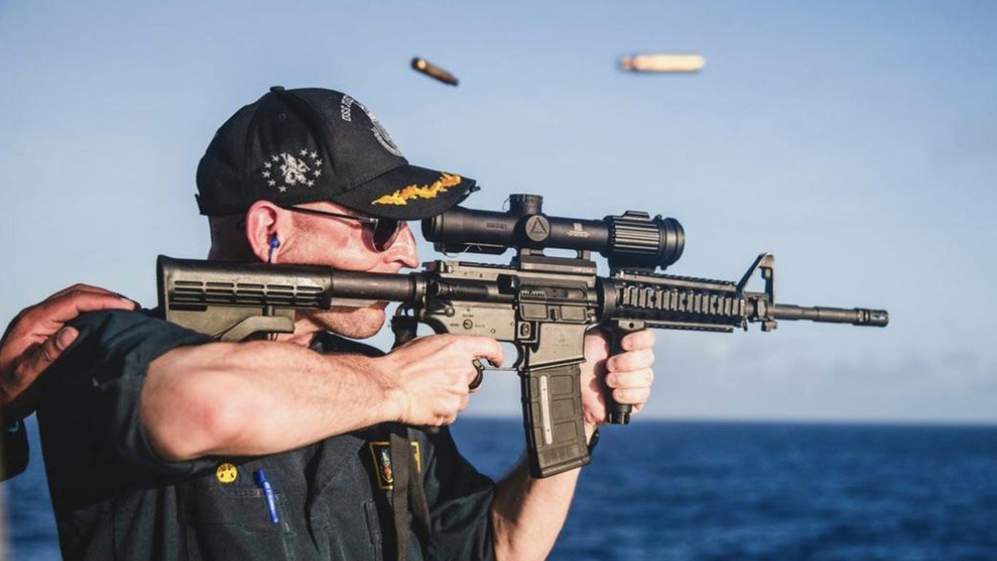 Navy commander relieved of duty after photo showed him firing rifle with scope backward