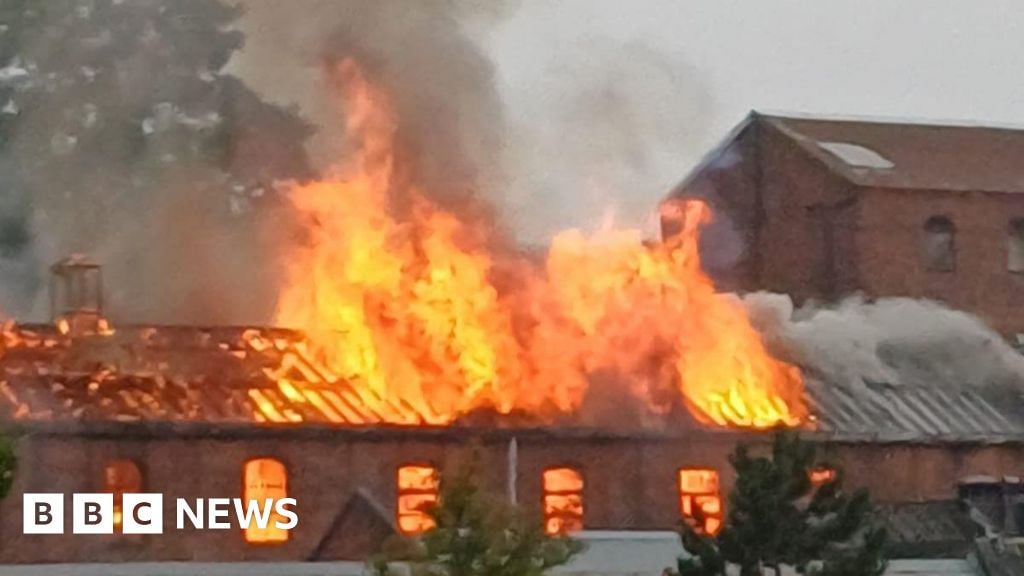 Roads closed as fire rages in town centre