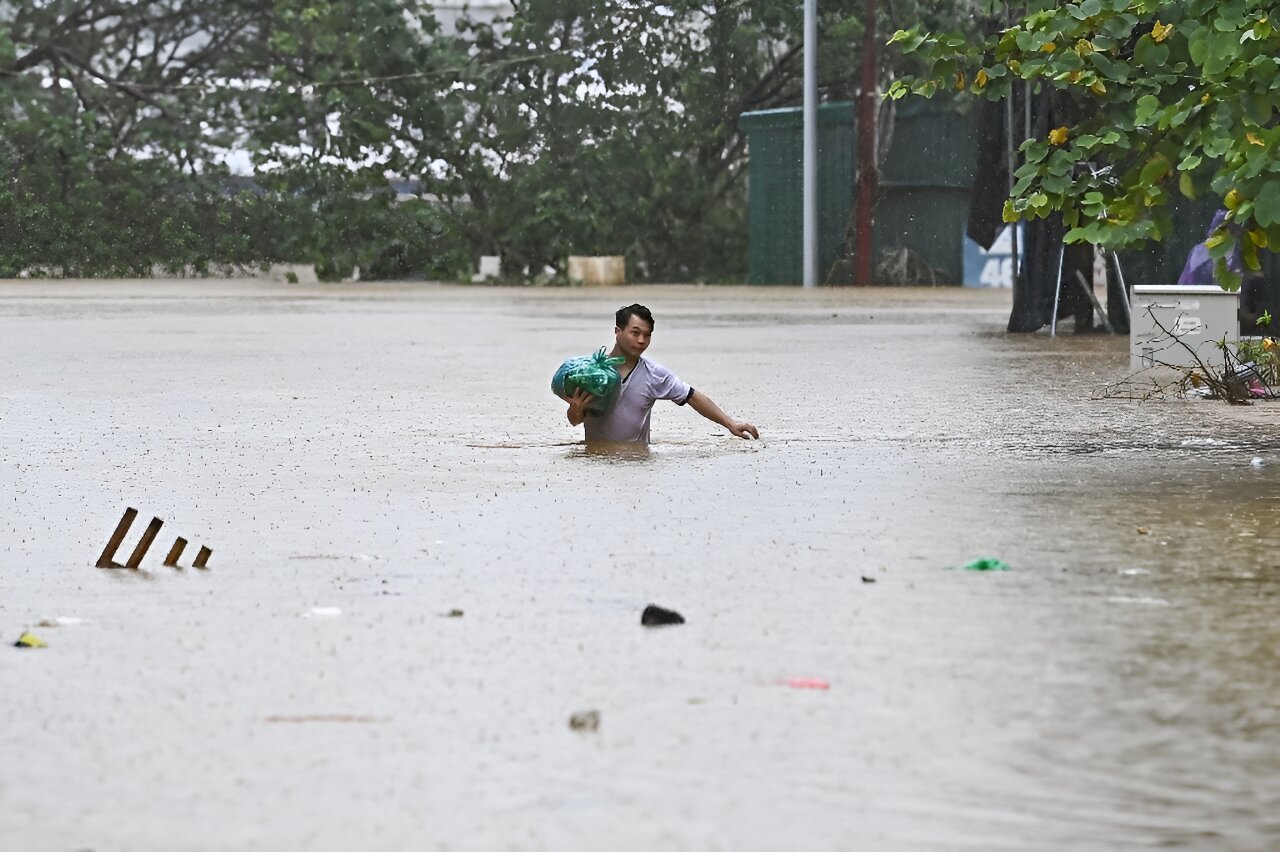 Hanoi river level hits 20-year high as SE Asia typhoon toll nears 200