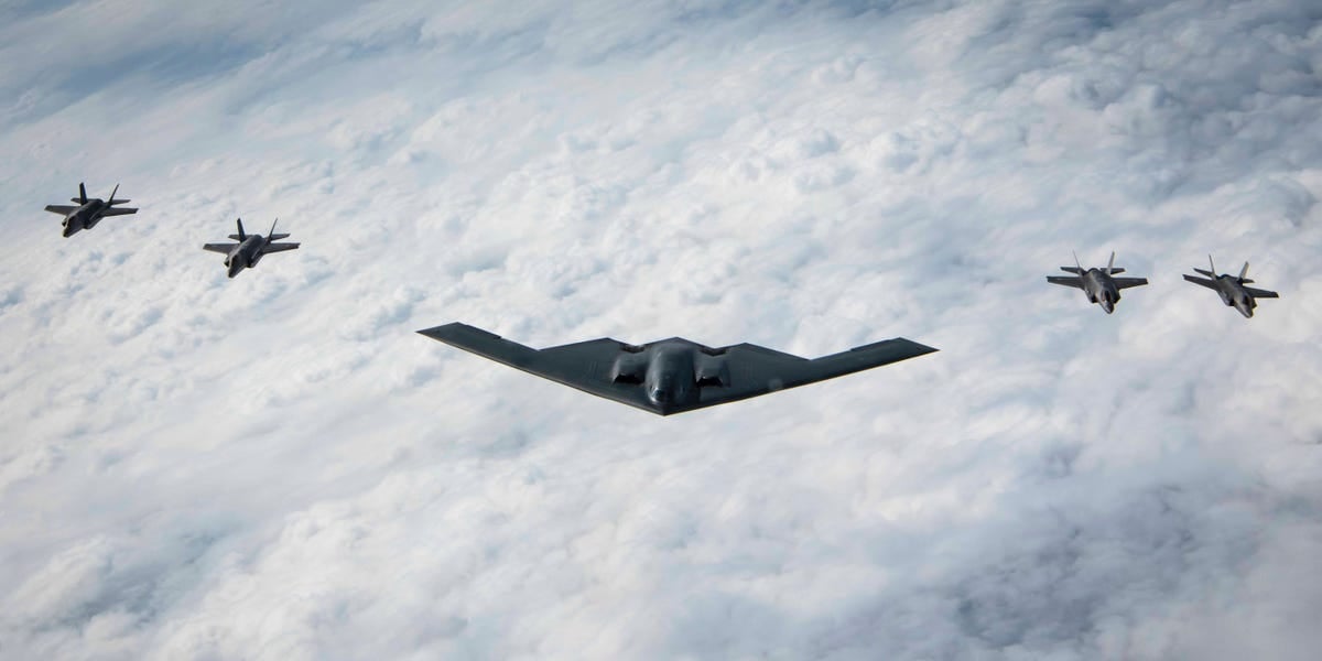 Photos show a US Air Force B-2 Spirit bomber flying with Japanese F-35s for the first time