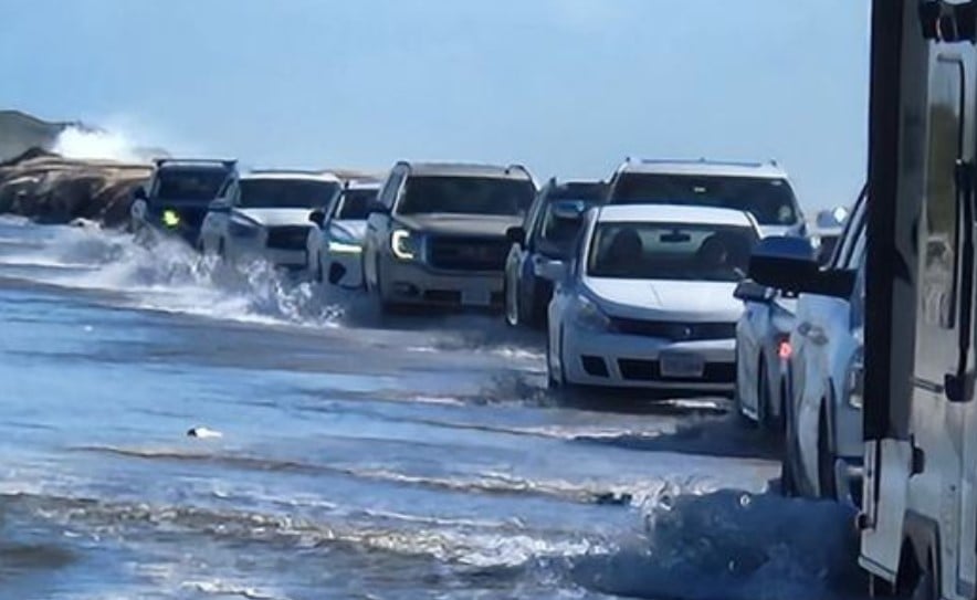 After 2 homes collapse, NC 12 flooded but open at Outer Banks; road could close at night