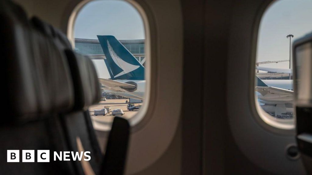 Cathay bans couple who started row over reclining seat