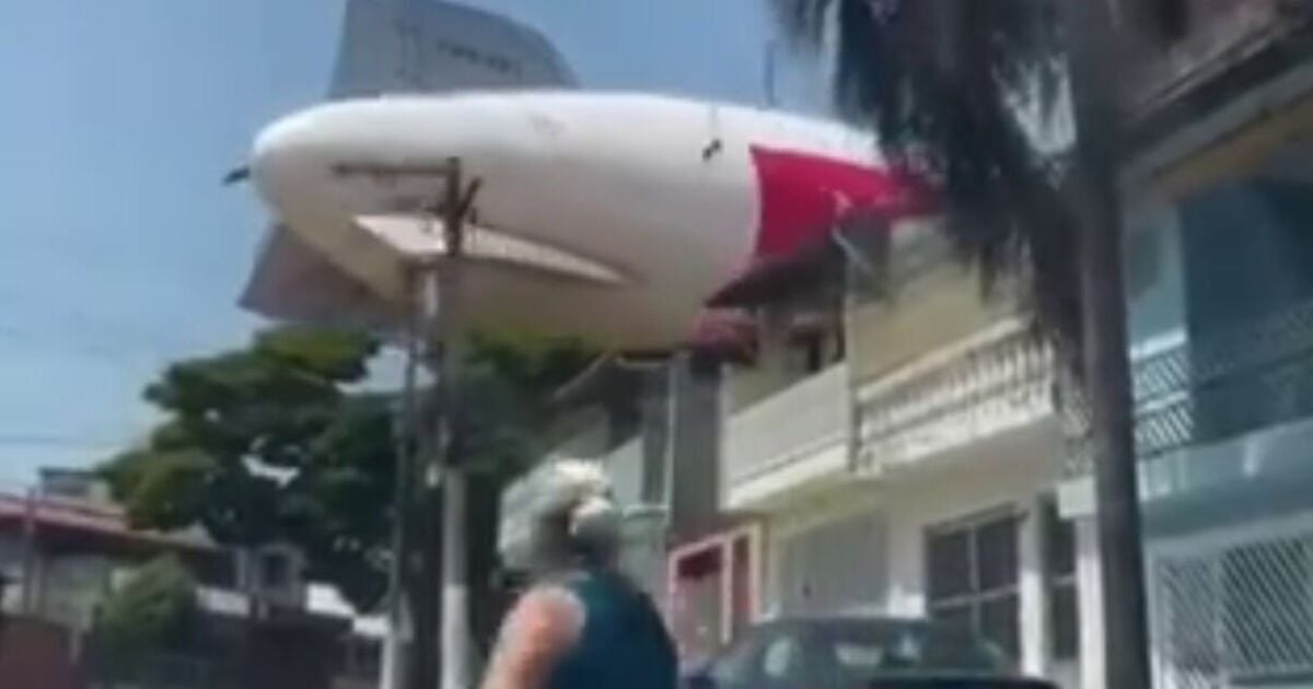 Blimp hired by football team crashes into row of houses in scary moment