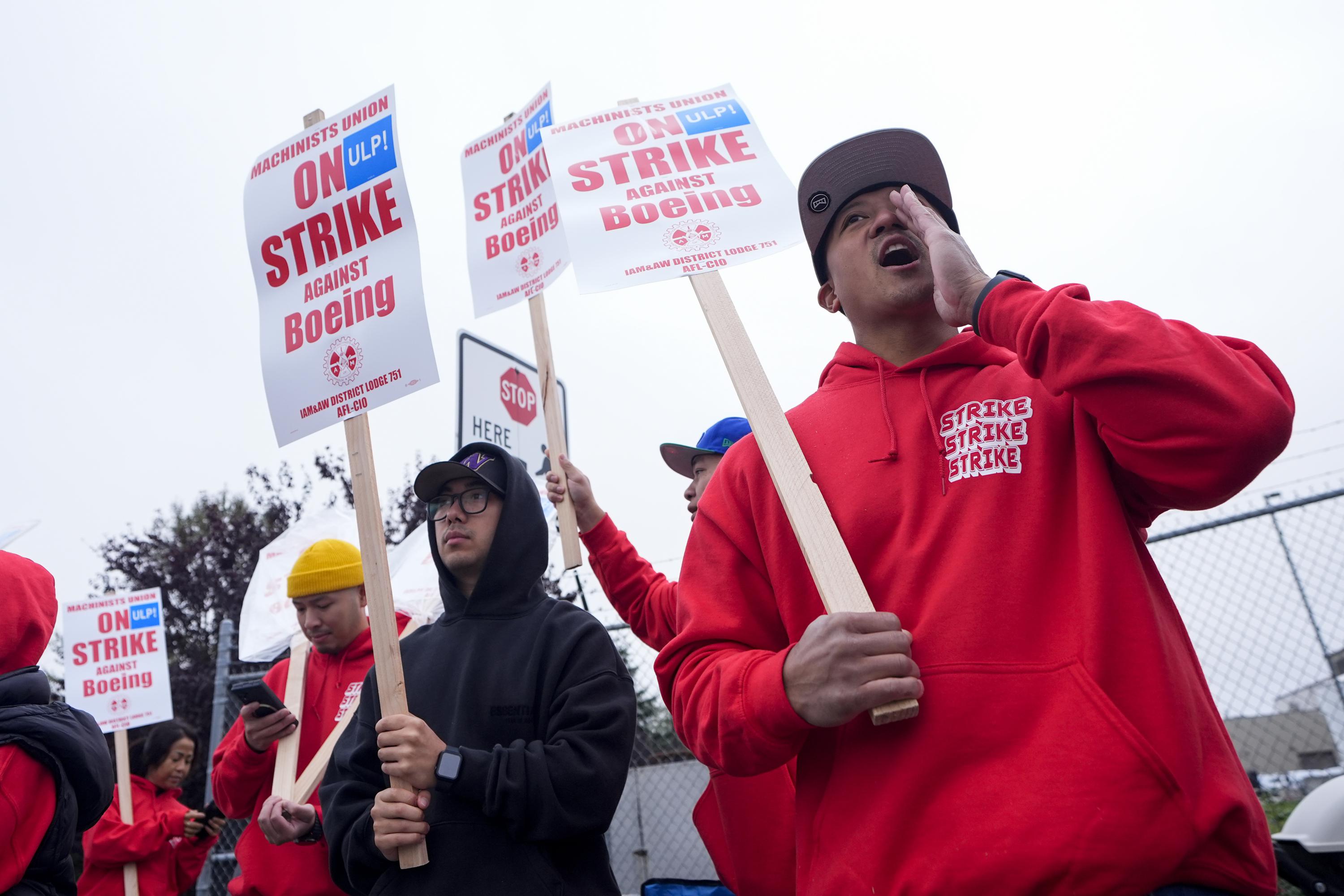 Boeing says it's considering temporary layoffs to save cash during the strike by machinists