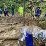 Flash flood sweeps away hamlet as storm toll rises to 155 dead