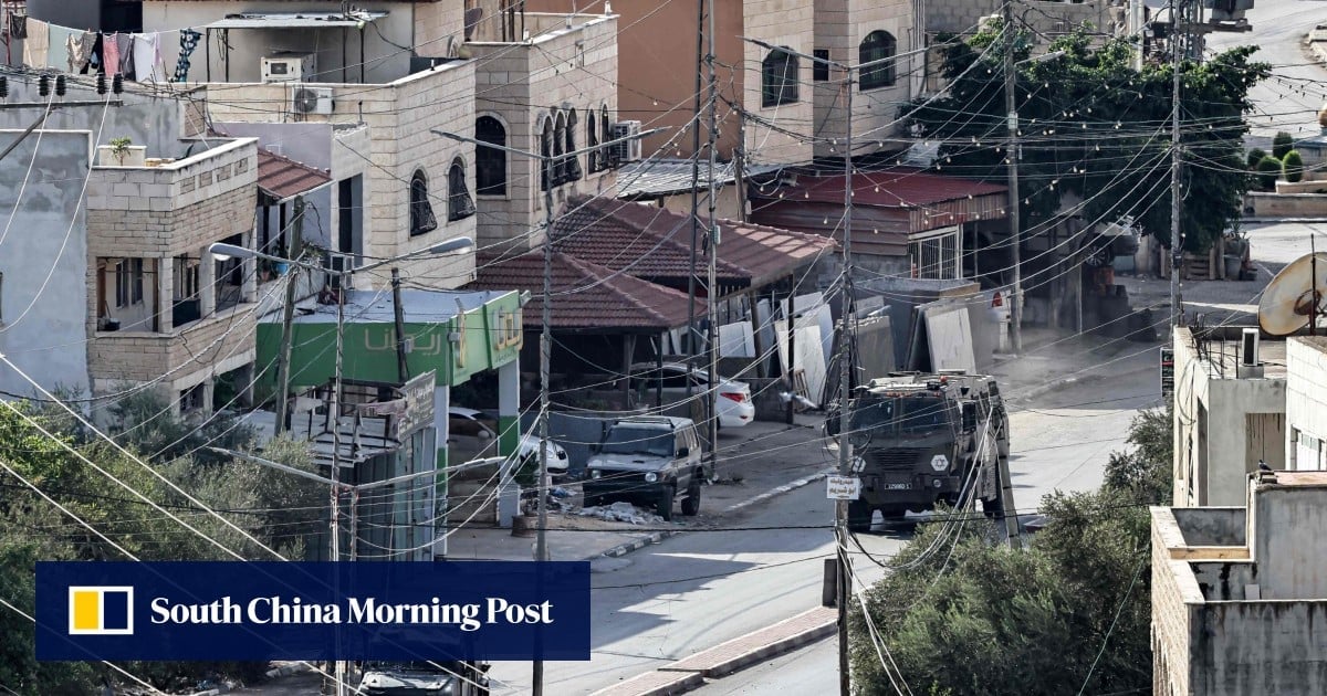 Footage shows Israeli soldier pushing body off roof in West Bank raid