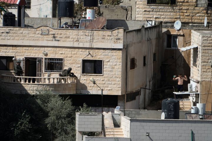 Israeli soldiers filmed pushing bodies of Palestinians off roof in West Bank