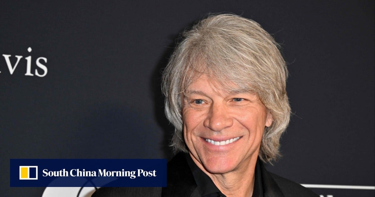 Keep the faith: Grammy-winning star Jon Bon Jovi helps woman standing on edge of US bridge