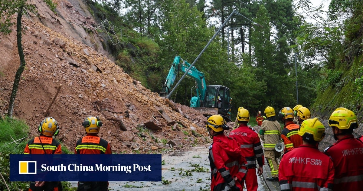 Landslide closes Hong Kong road as firefighters sweep area for anyone trapped under rubble