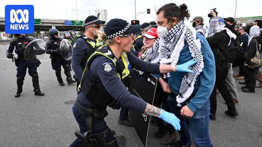 Large crowd of protesters gather at Land Forces defence expo in Melbourne's CBD