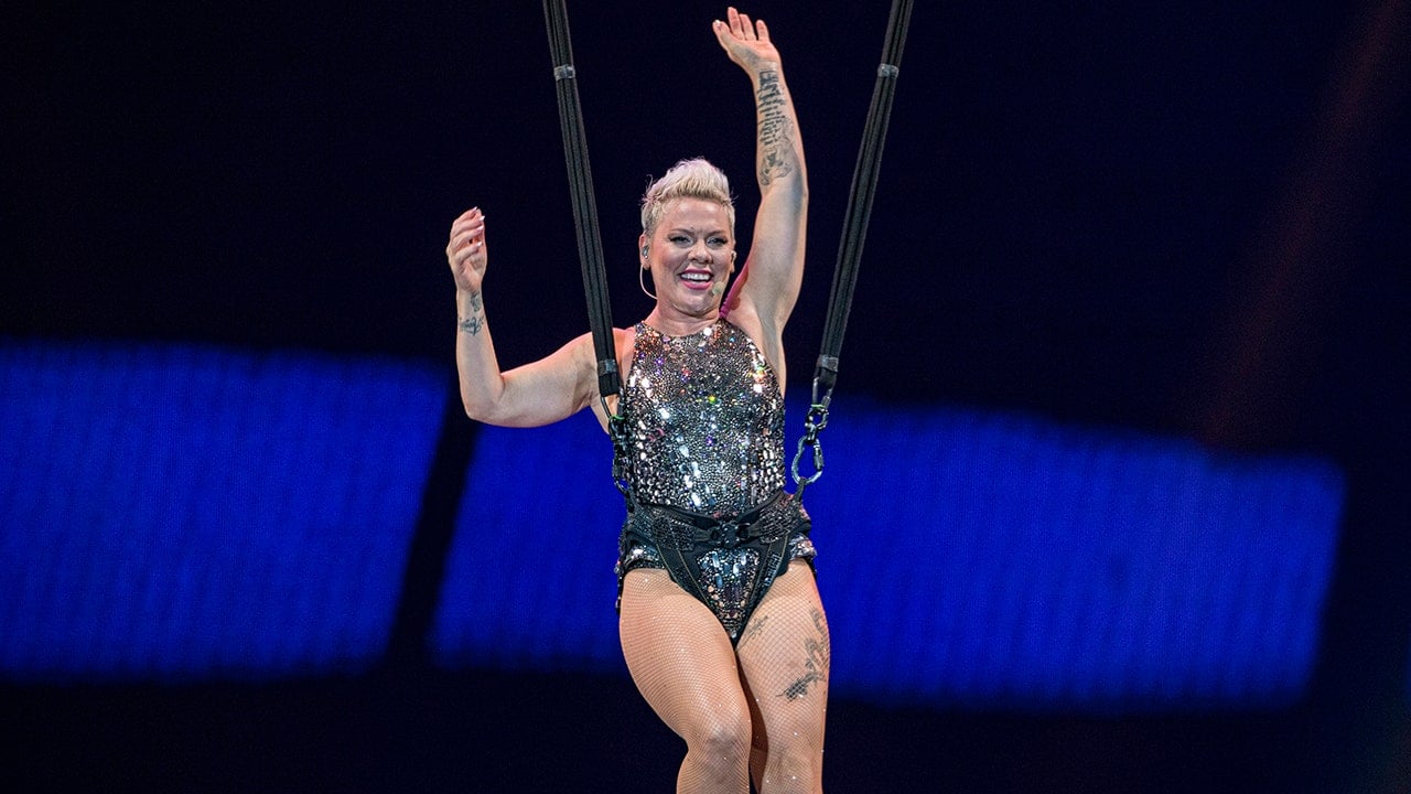 Pink pushes through aerial performance after injuring knee during concert: 'You don't need knees to fly'