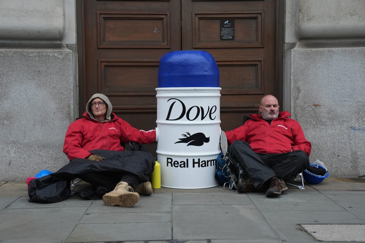 Police arrest 18 people after Greenpeace activists block Unilever HQ in the City 