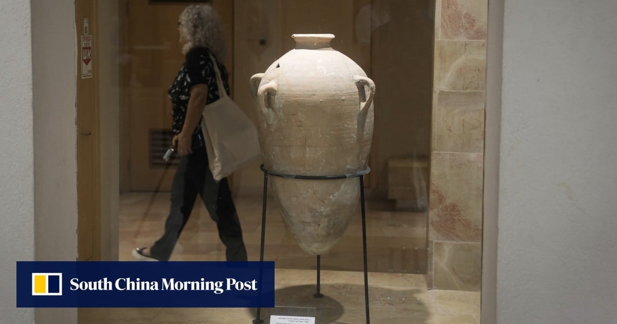 Rare Bronze Age jar broken by boy back on display at Israeli museum after repair