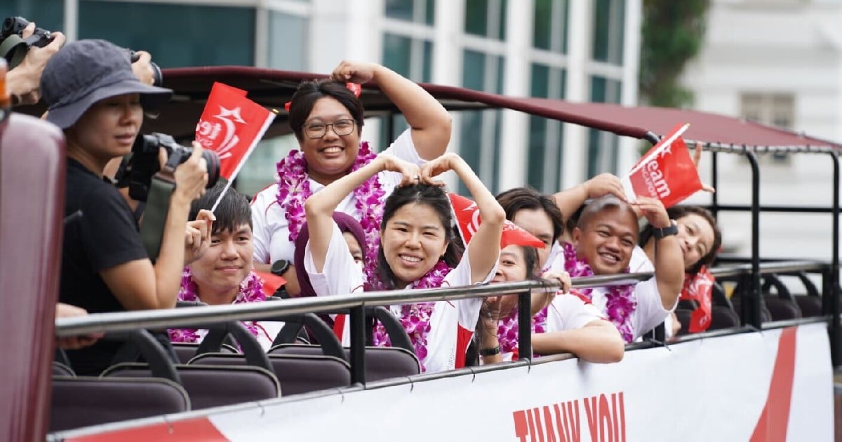 Singapore cheers for Paralympians on celebratory bus parade through town 