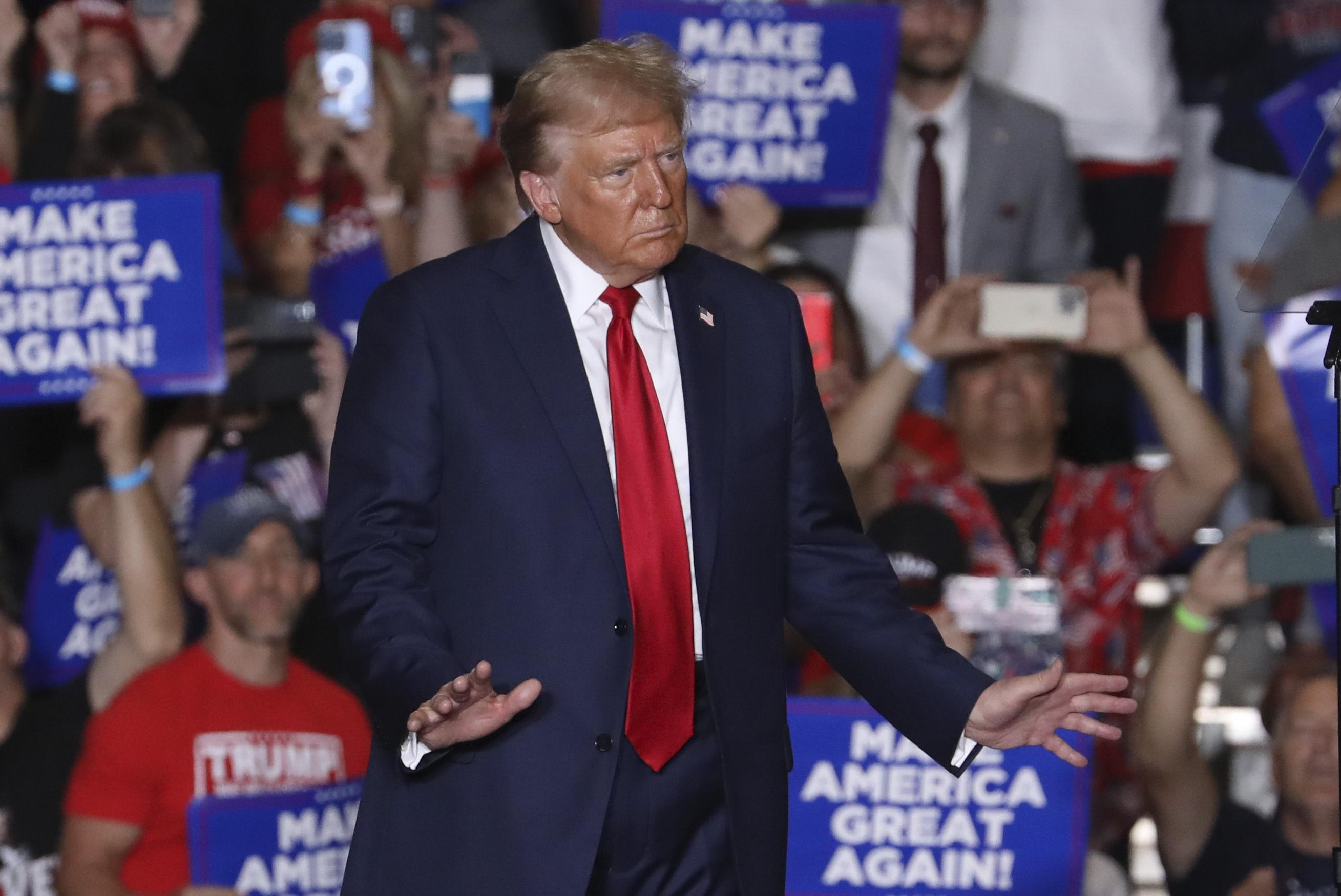 Trump escalates attacks on Harris' mental fitness and suggests she should be prosecuted