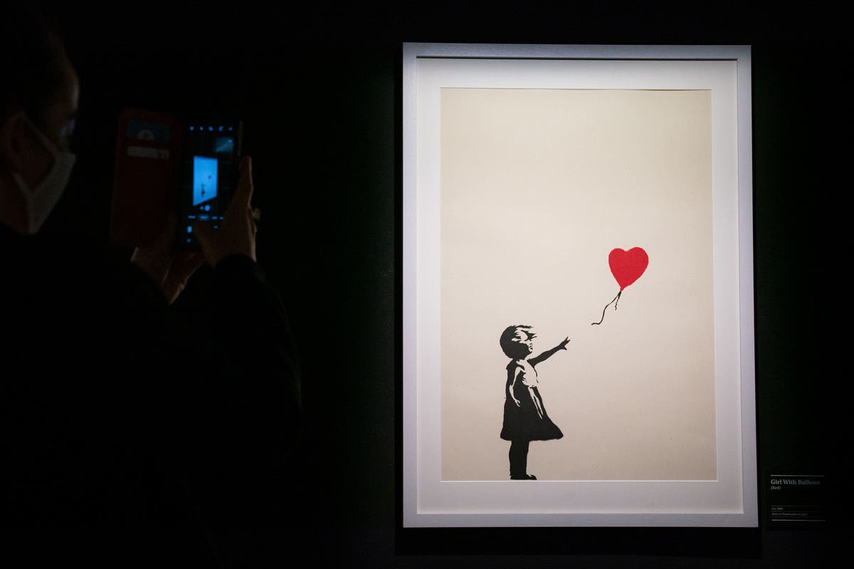 Two charged with burglary after Banksy's Girl with Balloon painting stolen from London gallery