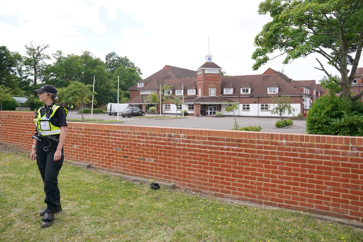 Two men who threw objects and banged on doors of asylum-seeker hotel jailed