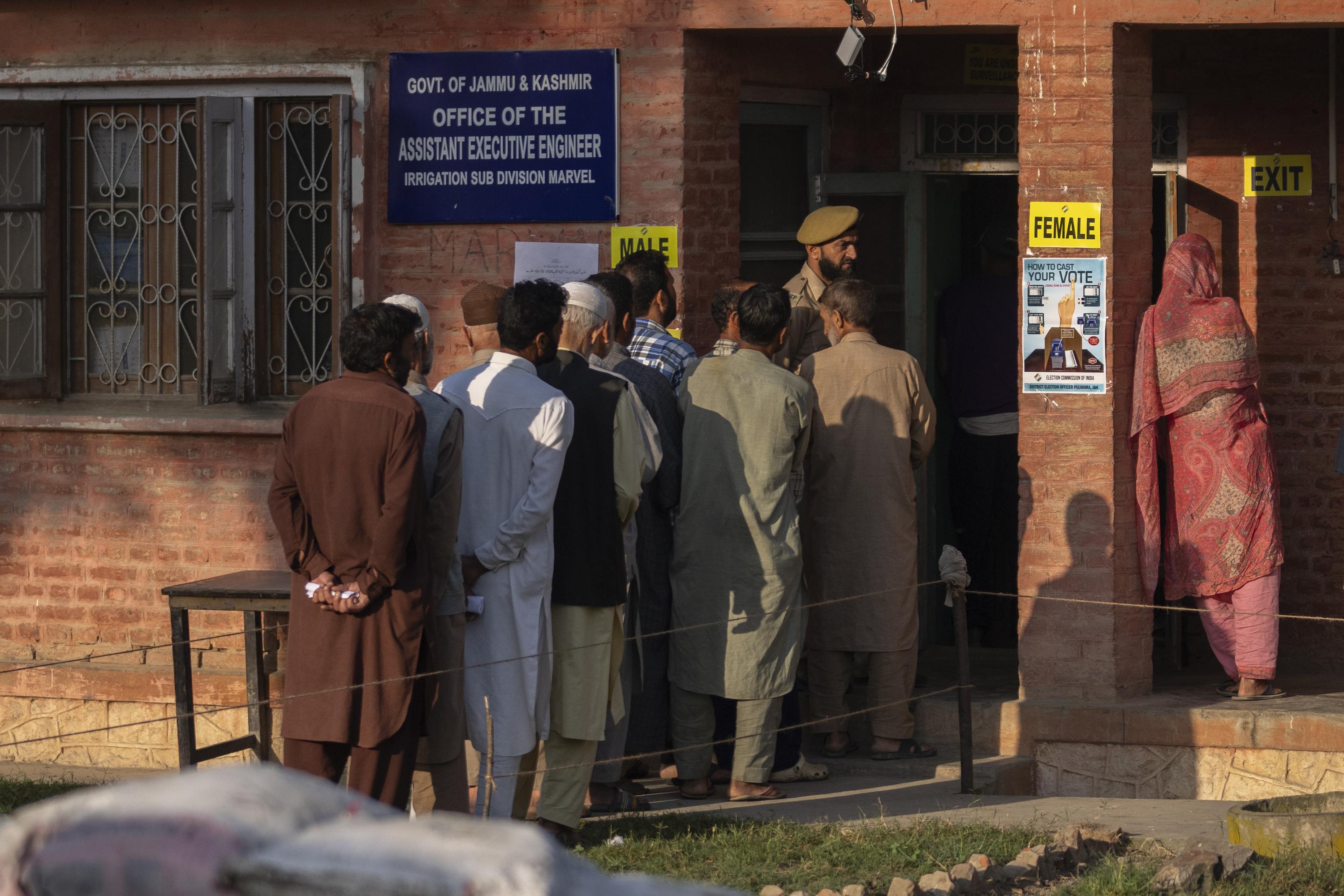 Voting for local government opens in Indian-controlled Kashmir for first time after losing autonomy