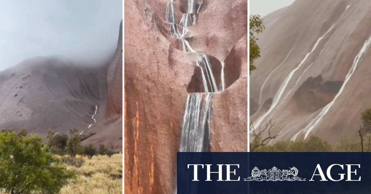 Waterfalls pouring down the sides of Uluru