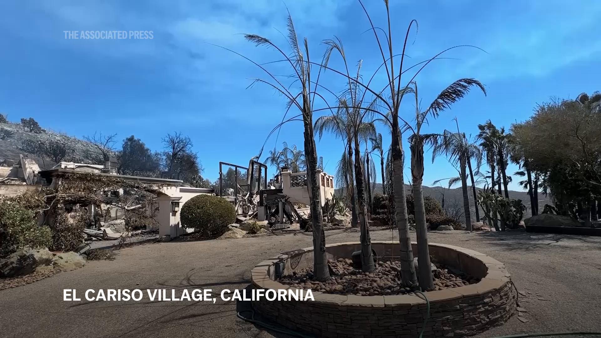 Wildfires in Southern California torch dozens of homes and force thousands to evacuate