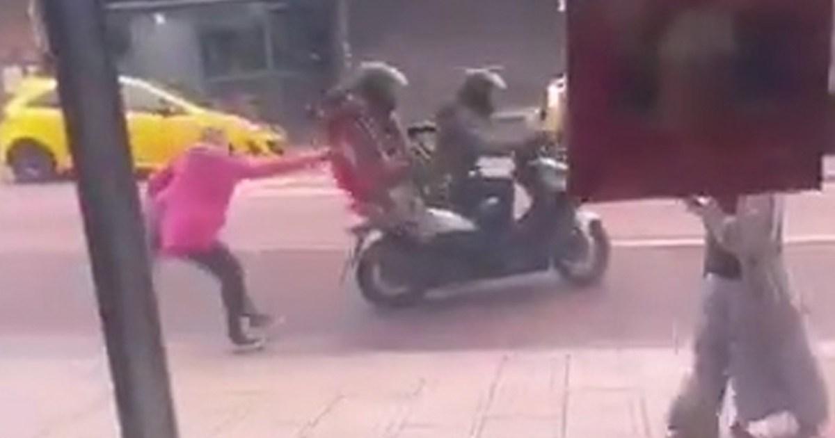 Woman stops e-bike thieves by yanking one off moped as they tried to speed off