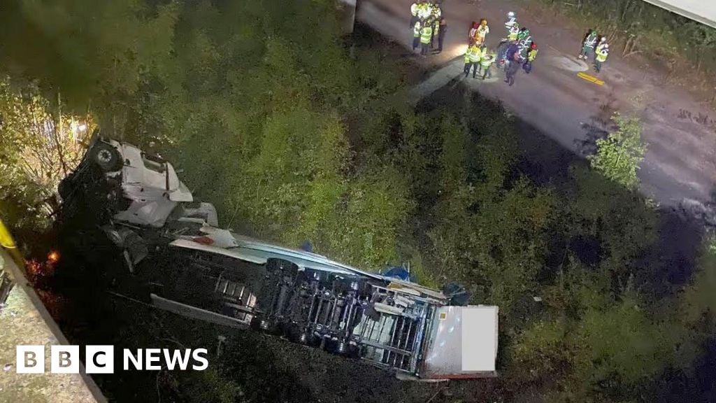 Motorway warning after lorry falls 60m from bridge