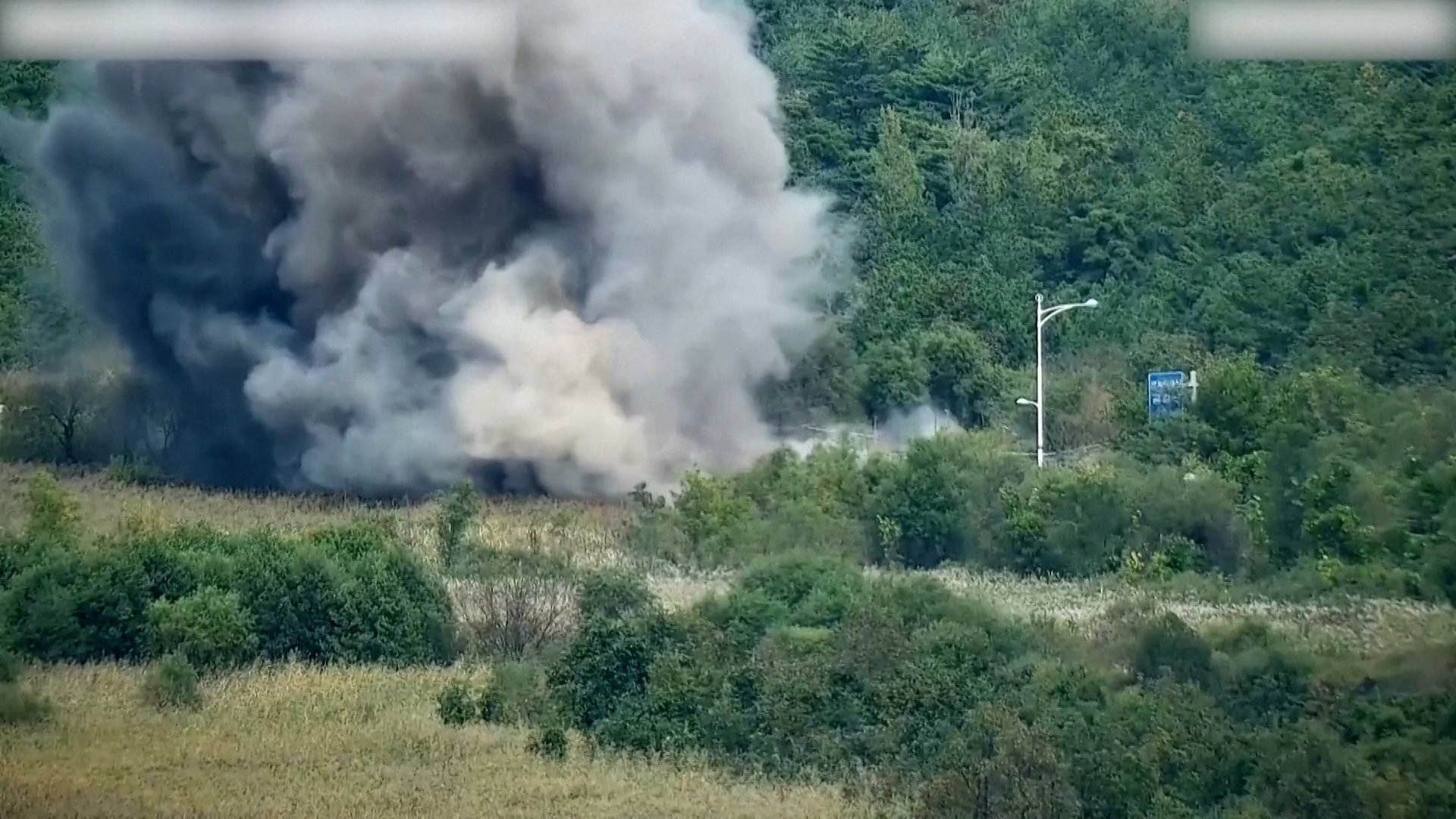 Video shows North Korea blowing up roads to the South