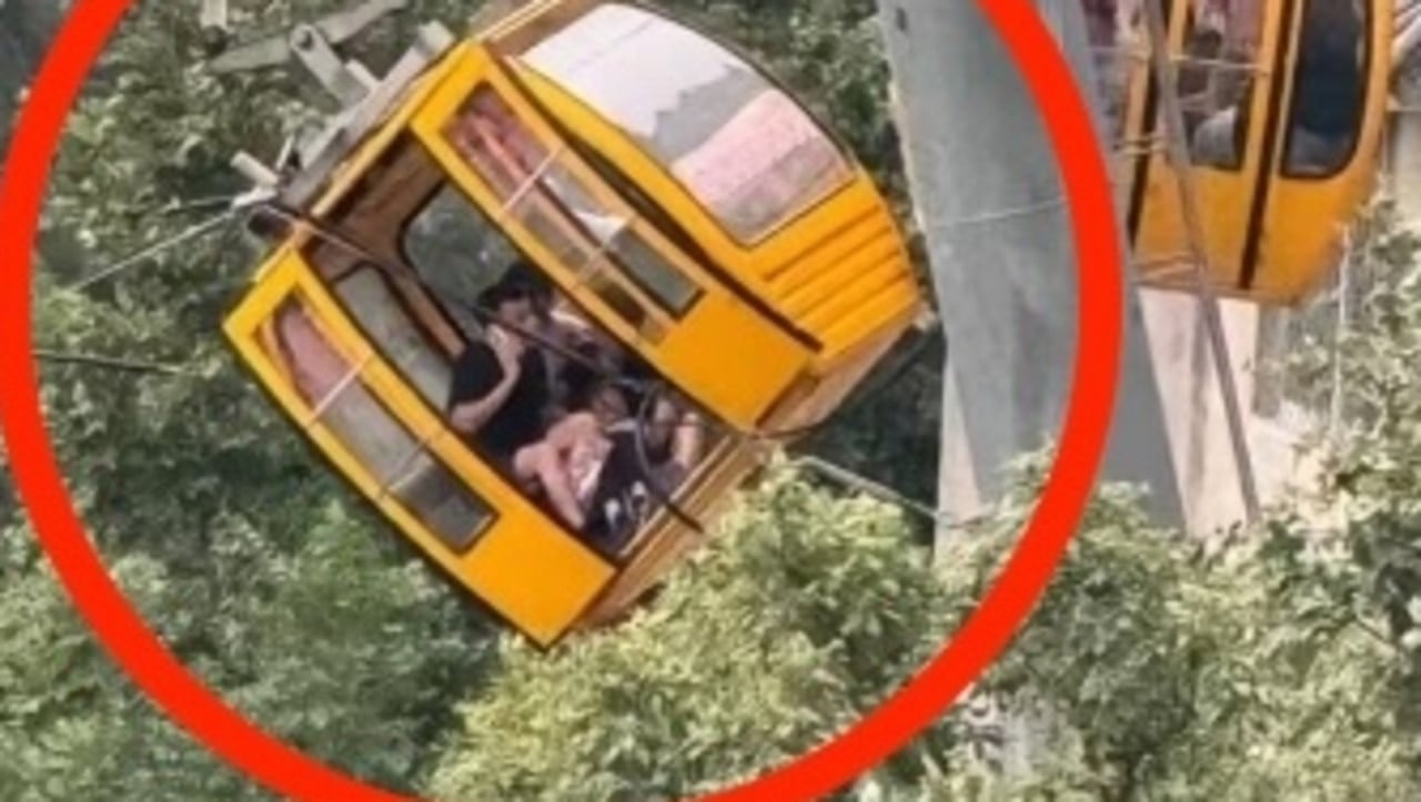 Cable car door opens, woman falls out