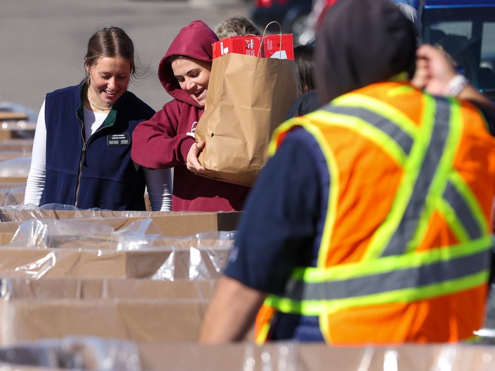 Food, housing prices have monthly food bank use soaring to 2 million