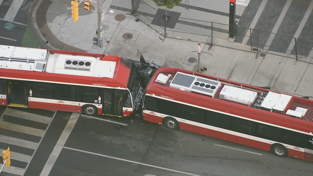 Four injured after car, 2 TTC buses collide: Toronto paramedics