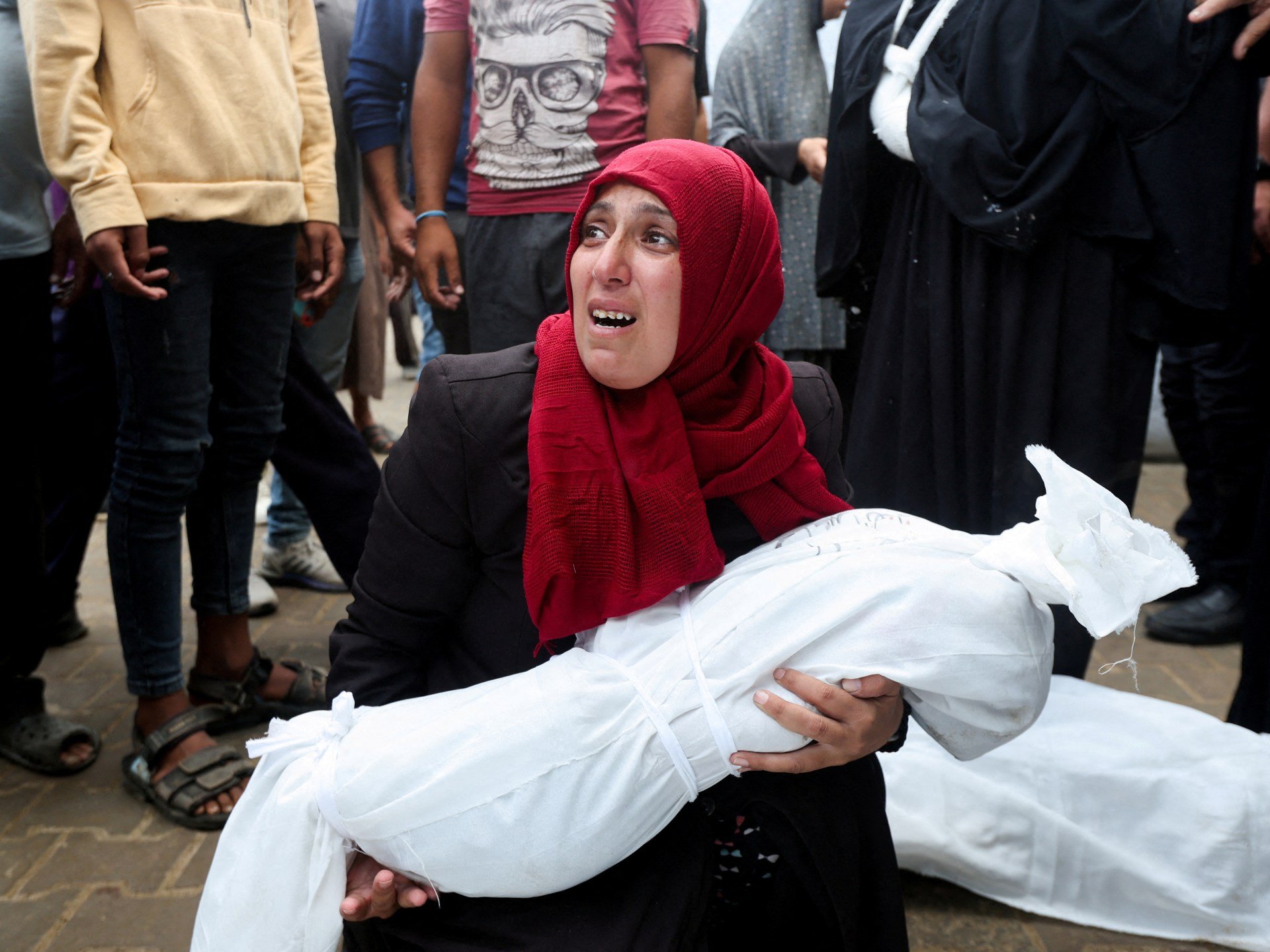 Israeli strikes kill dozens in Gaza as grisly anniversary passes