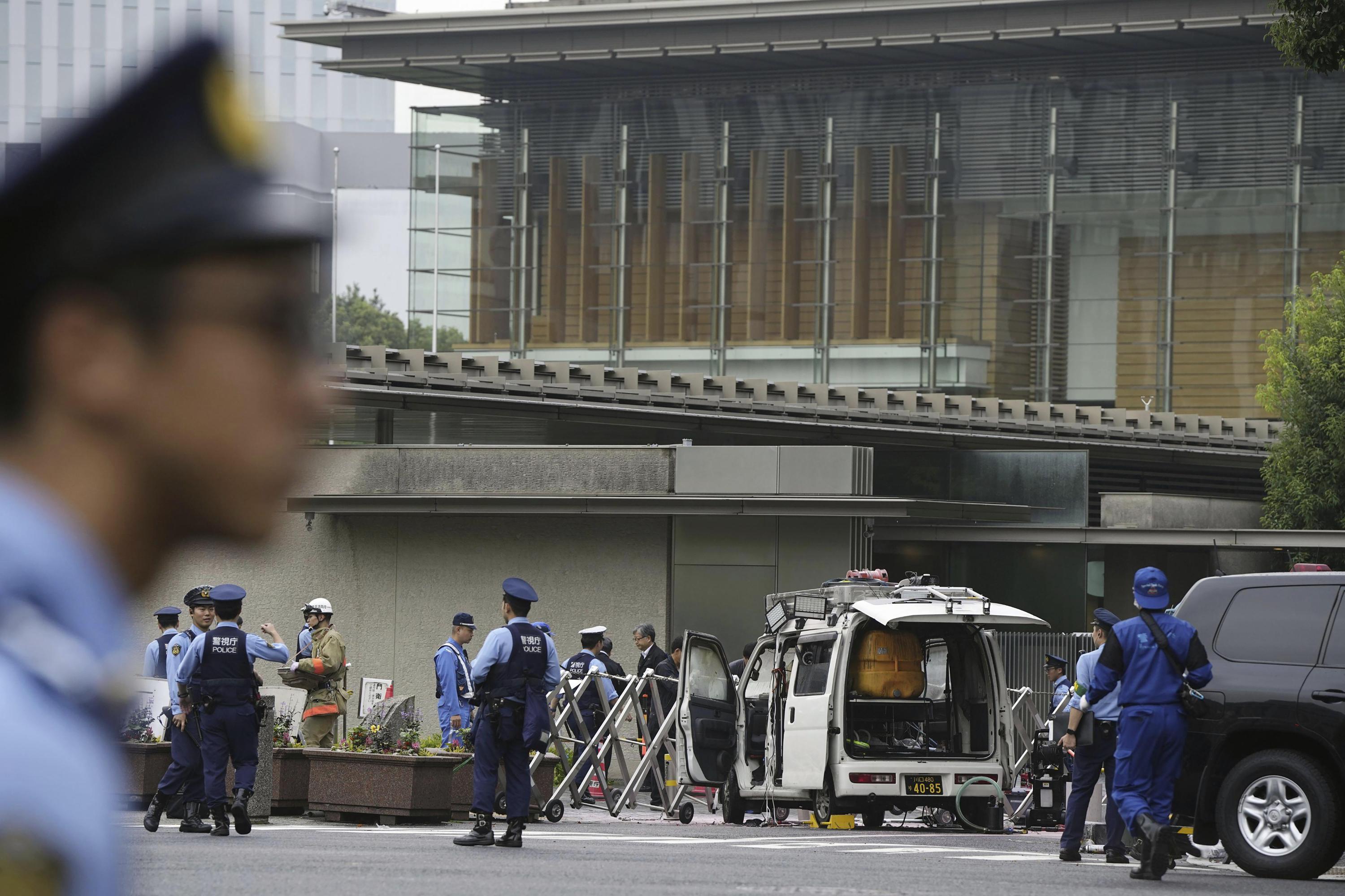 Japan's ruling party headquarters is attacked with firebombs and suspect is arrested