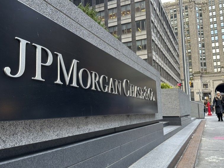 JPMorgan net income falls as bank sets aside more money to cover potential bad loans