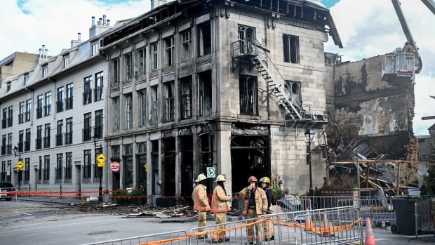 New footage of deadly Old Montreal fire shows masked person leaving the scene