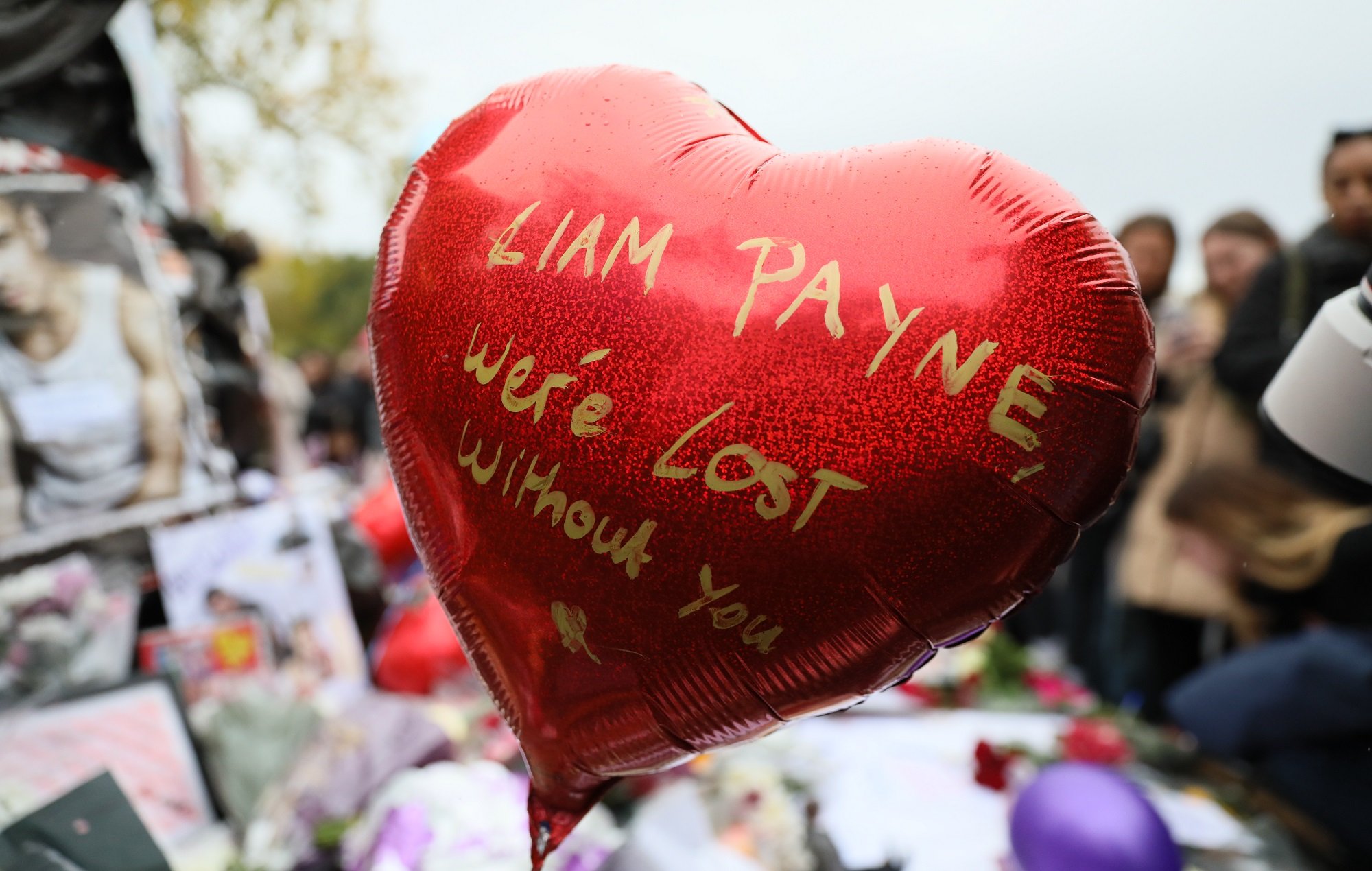 One Direction fans mourn Liam Payne at London Hyde Park vigil