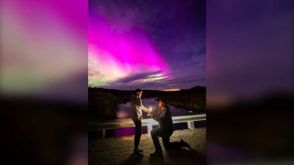 Picture-perfect engagement under Manitoba northern lights