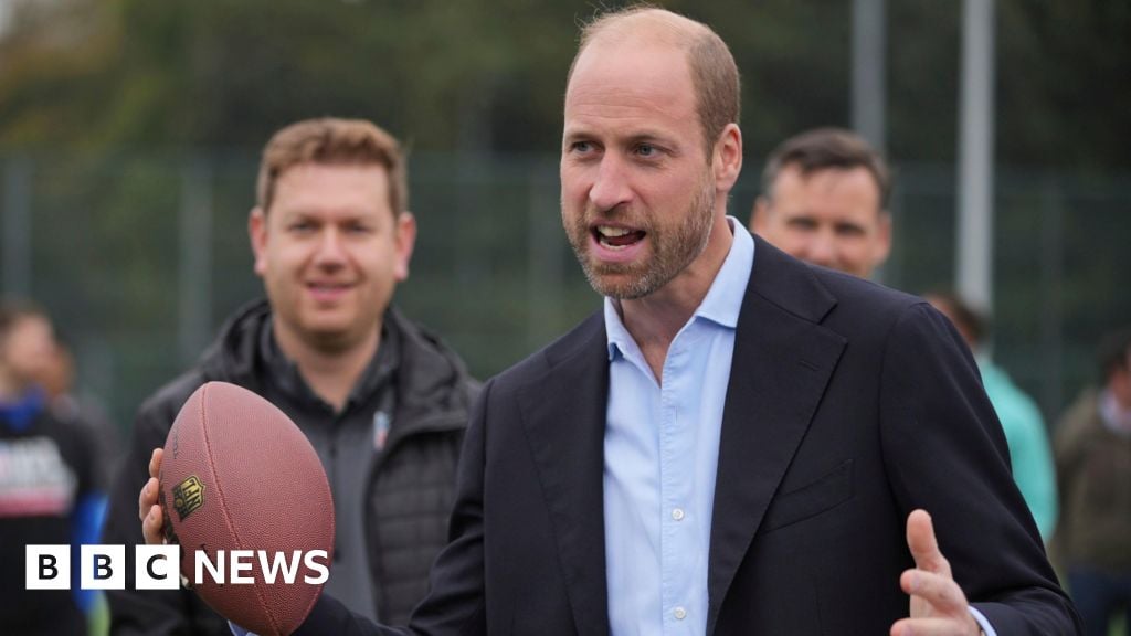 Prince William touches down with American football