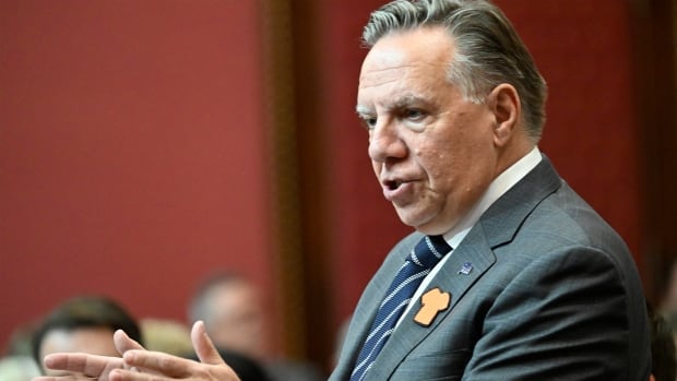 Quebec premier says Ottawa should forcibly relocate half of asylum seekers