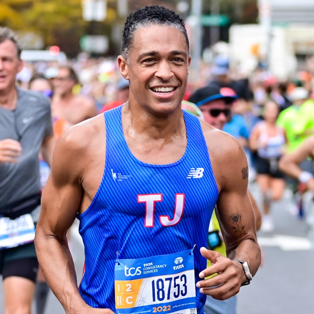  T.J. Holmes Suffers Injury Running Chicago Marathon With Amy Robach 