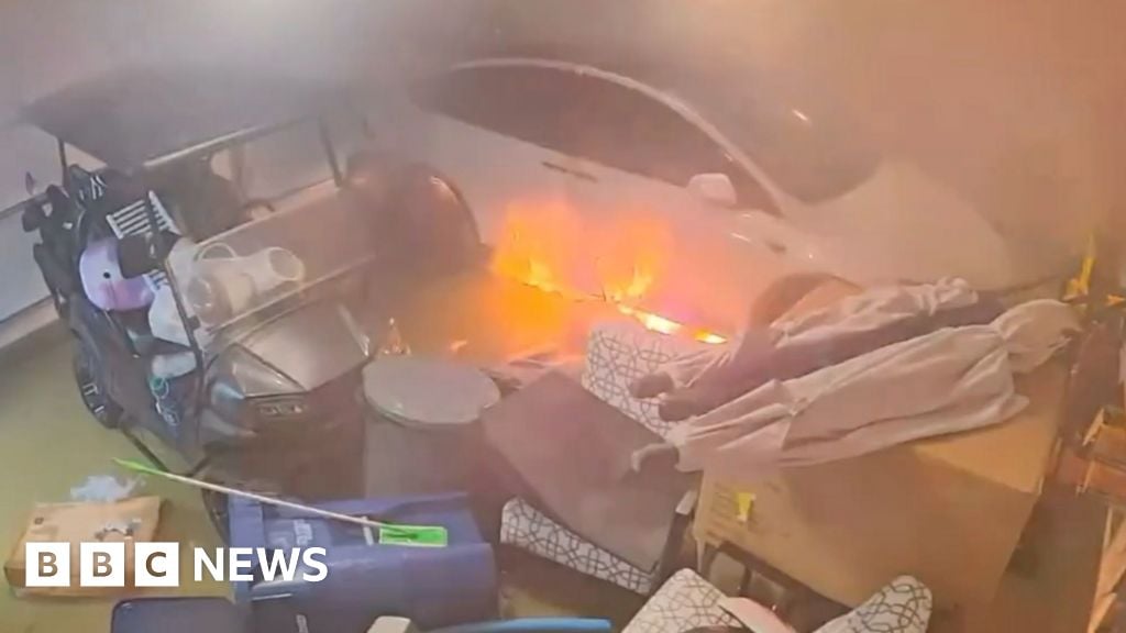 Tesla catches fire in flooded garage during Helene